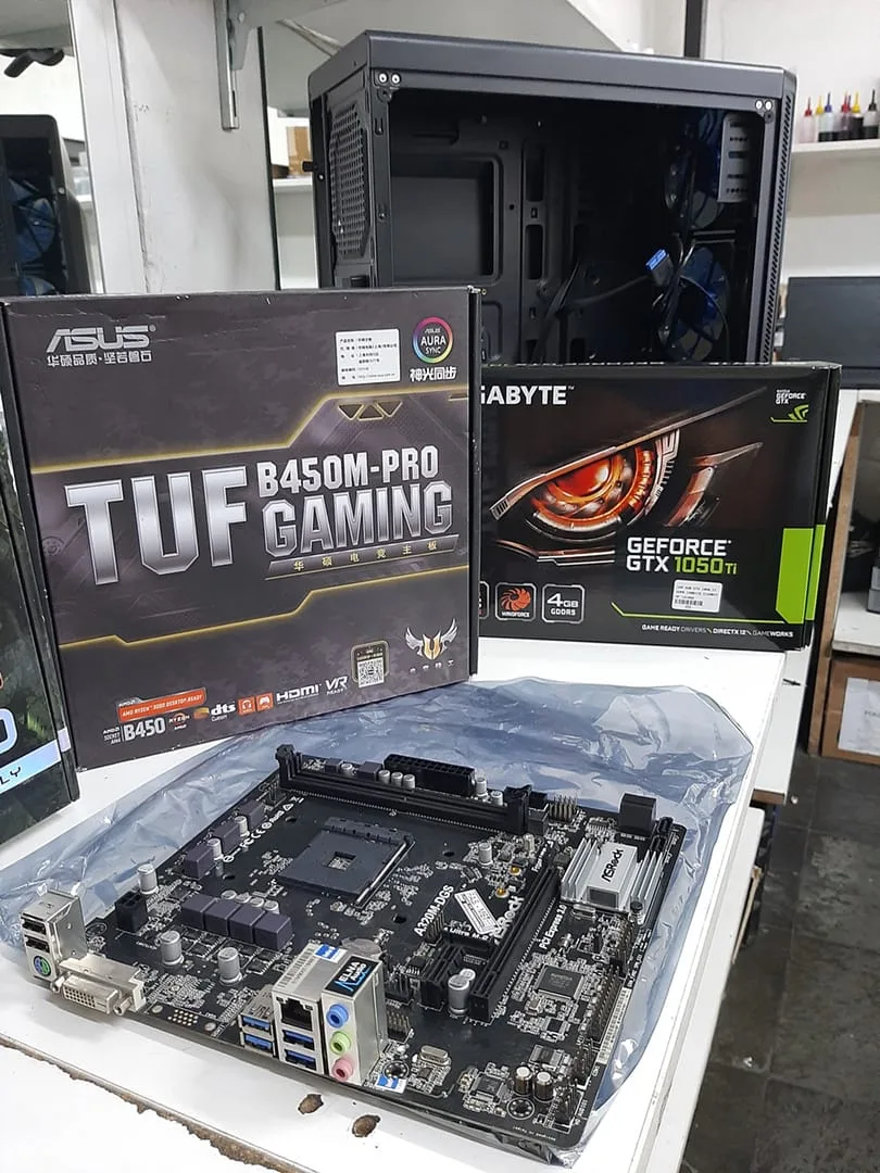 Componentes para montagem de PC gamer: placa-mãe ASUS TUF B450M e placa de vídeo Gigabyte GTX 1050Ti em Itaquaquecetuba
